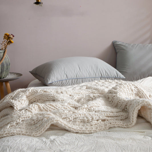 Hand-woven thick wool blanket used as sofa throw and decorative home accessory