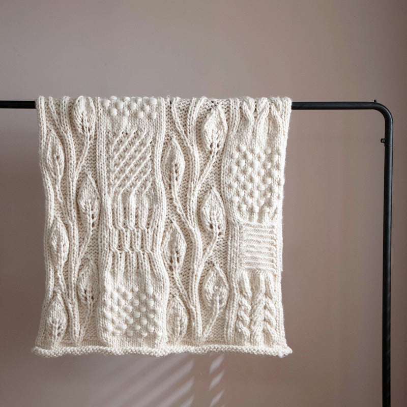 Hand-woven thick wool blanket used as sofa throw and decorative home accessory