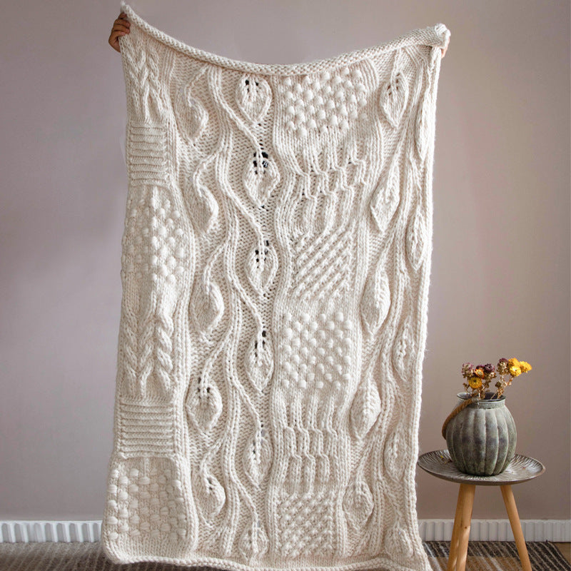 Hand-woven thick wool blanket used as sofa throw and decorative home accessory