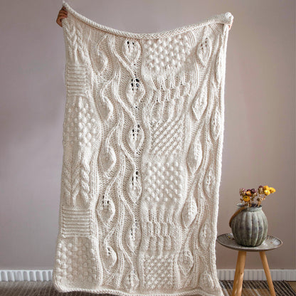 Hand-woven thick wool blanket used as sofa throw and decorative home accessory