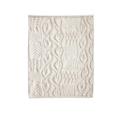 Hand-woven thick wool blanket used as sofa throw and decorative home accessory