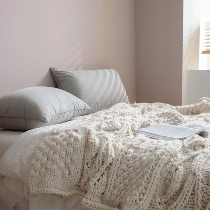 Hand-woven thick wool blanket used as sofa throw and decorative home accessory
